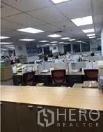 Office Space for rent in Khlong Toei, Bangkok - Large open office area with multiple workstations, swivel chairs and bright ceiling lights.