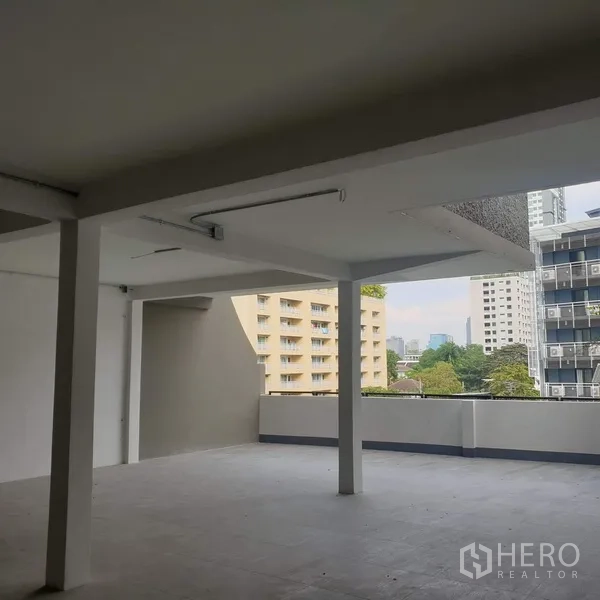 Home Office for rent in Khlong Toei, Bangkok - Large terrace of the home office with partial roof cover overlooking the Bangkok skyline.