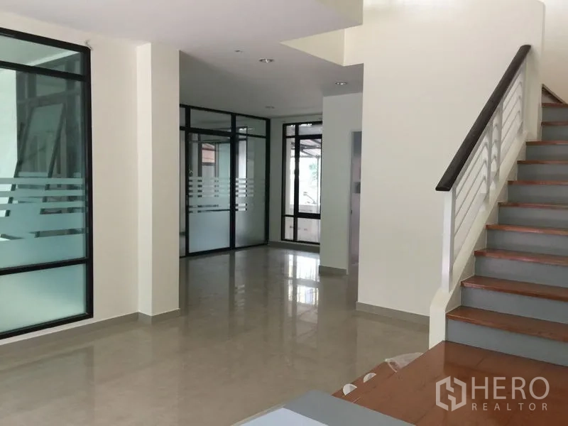 Office Space for rent in Bang Kho Laem, Bangkok - Ground-floor lobby with staircase and glass-partitioned rooms.