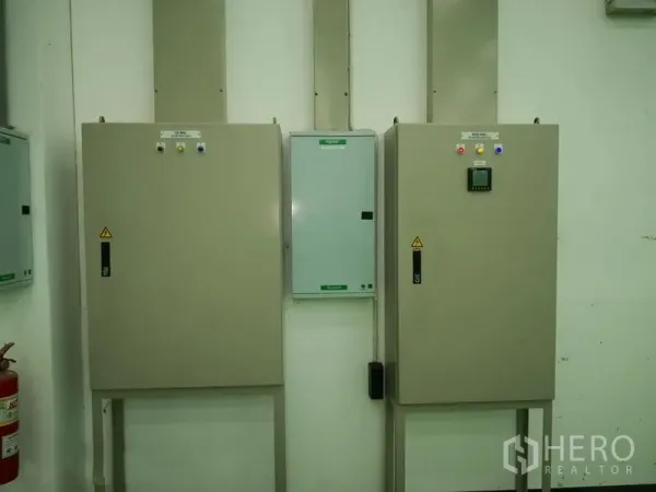 Warehouse for rent in Bang Phli, Samut Prakan - Industrial power distribution and control panels mounted inside the warehouse.