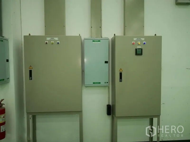 Warehouse for rent in Bang Phli, Samut Prakan - Industrial power distribution and control panels mounted inside the warehouse.