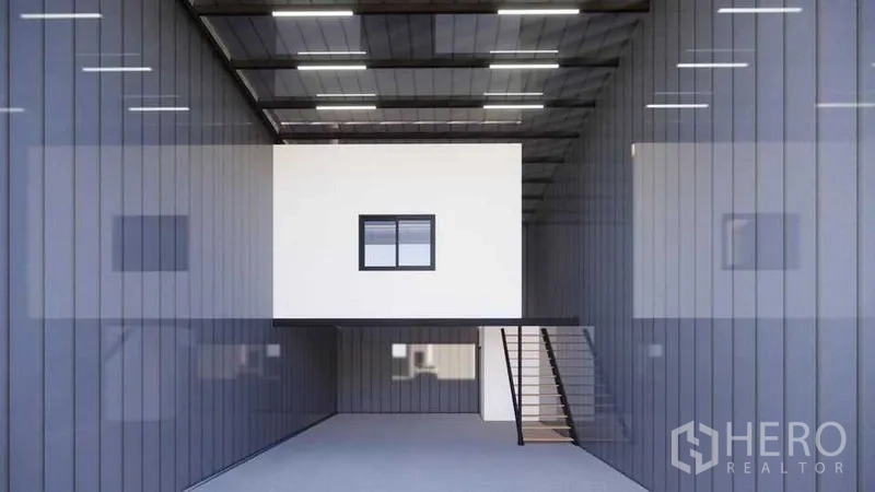 Warehouse for rent - Warehouse bay featuring white mezzanine office, steel staircase and insulated roof panels.