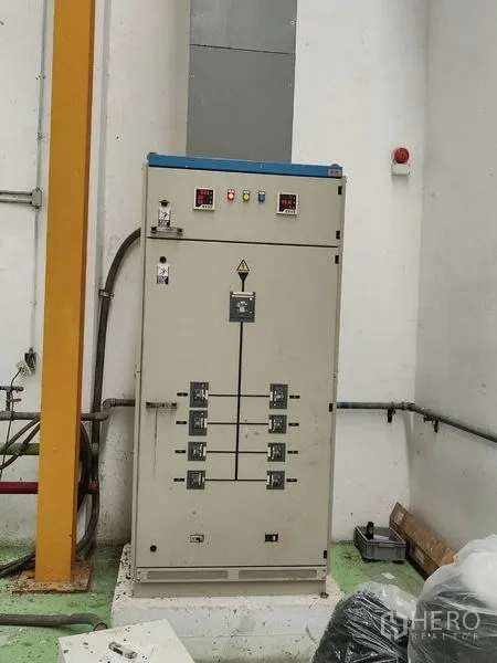 Factory for sale in Sai Noi, Nonthaburi - Industrial electrical control cabinet inside the factory.
