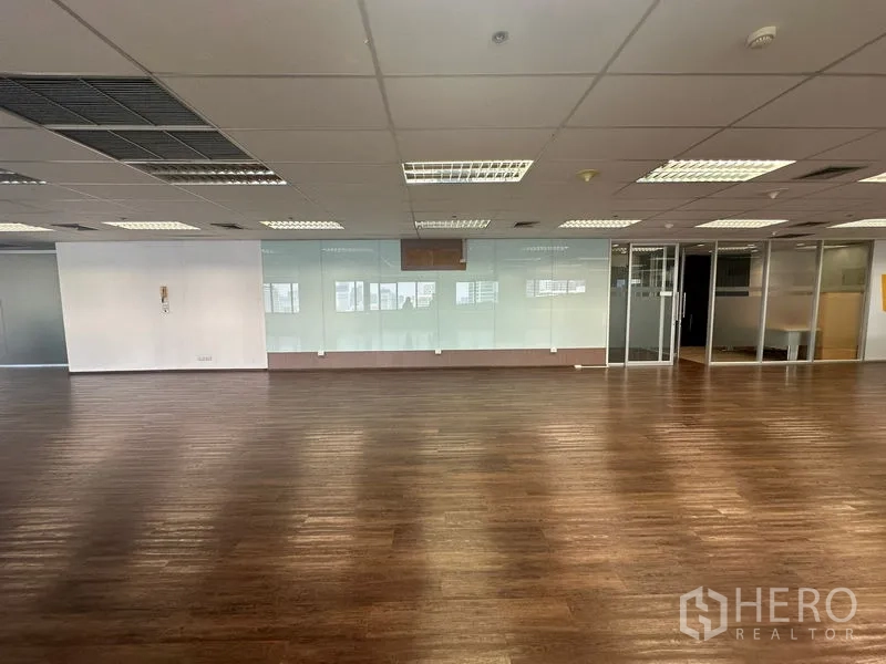 Office Space for rent in Bang Rak, Bangkok - Open workspace facing glass meeting rooms and partitions.