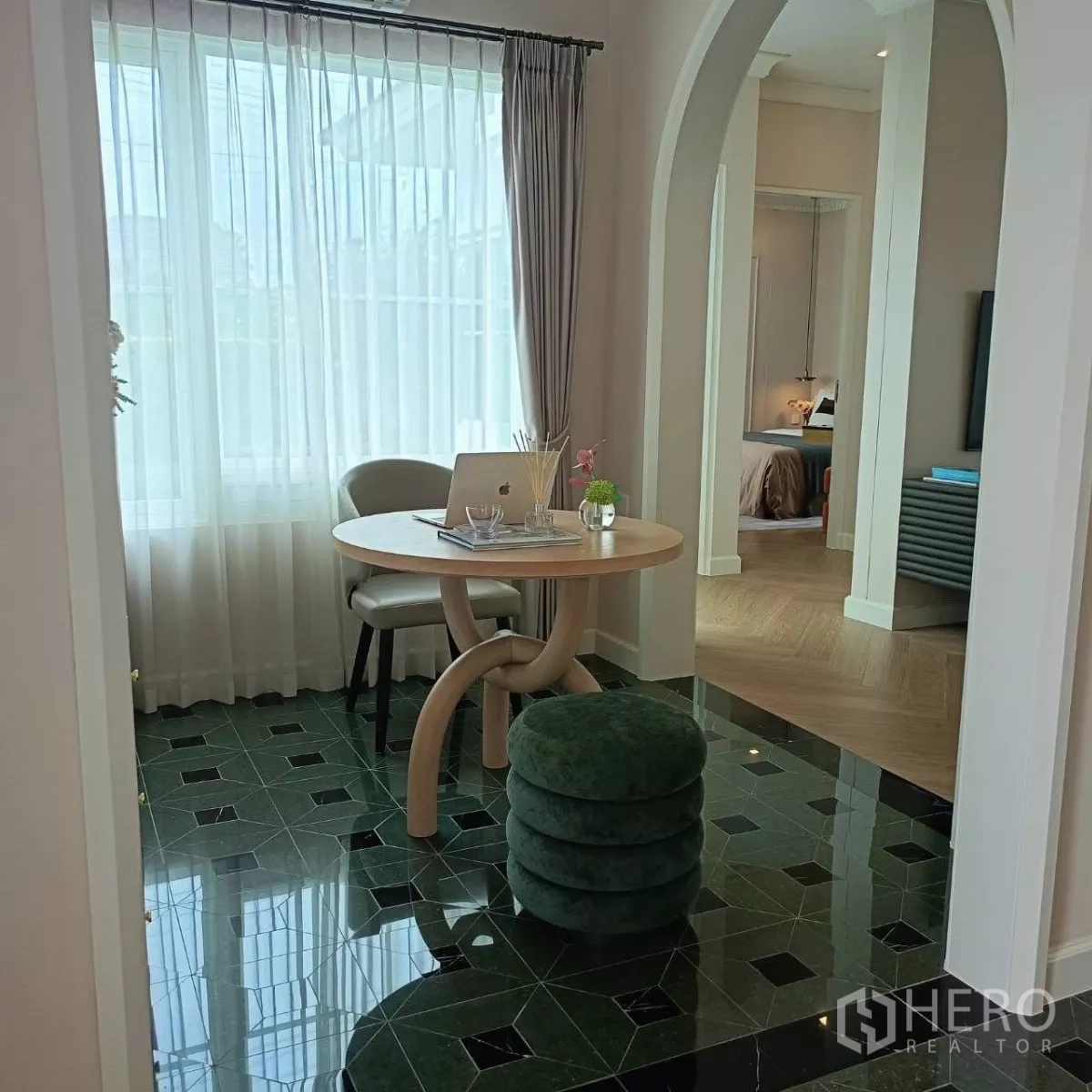 Detached House for rent in Bang Phli, Samut Prakan - Cozy home office nook by a sheer-curtained window and arched doorway.