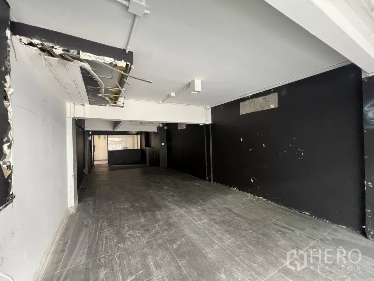 Retail Space for rent in Watthana, Bangkok - Partially refurbished retail floor with wide layout and white ceiling.