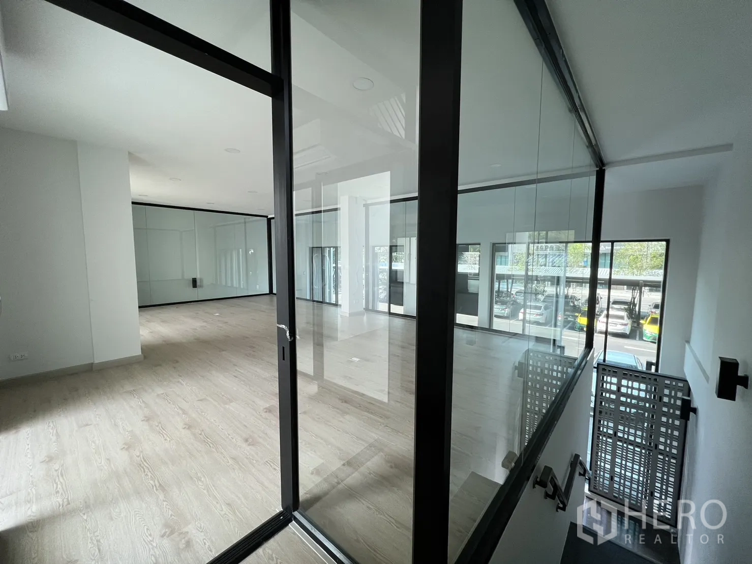 Home Office for rent in Bang Phli, Samut Prakan - Sliding glass entry to mezzanine office suite above the stairs.