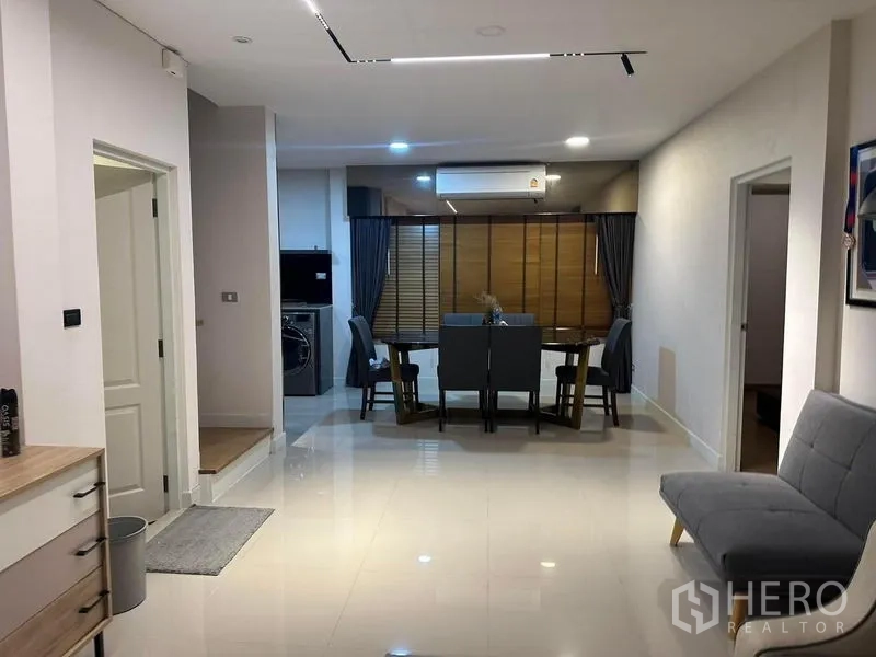 Detached House for rent in Bang Phli, Samut Prakan - Open-plan living and dining area looking toward the kitchen.