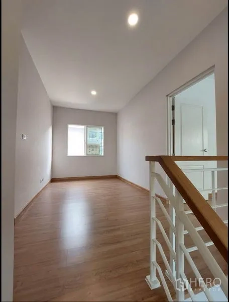 Detached House for sale in Bang Yai, Nonthaburi - Second-floor corridor beside staircase with window and bedroom entry