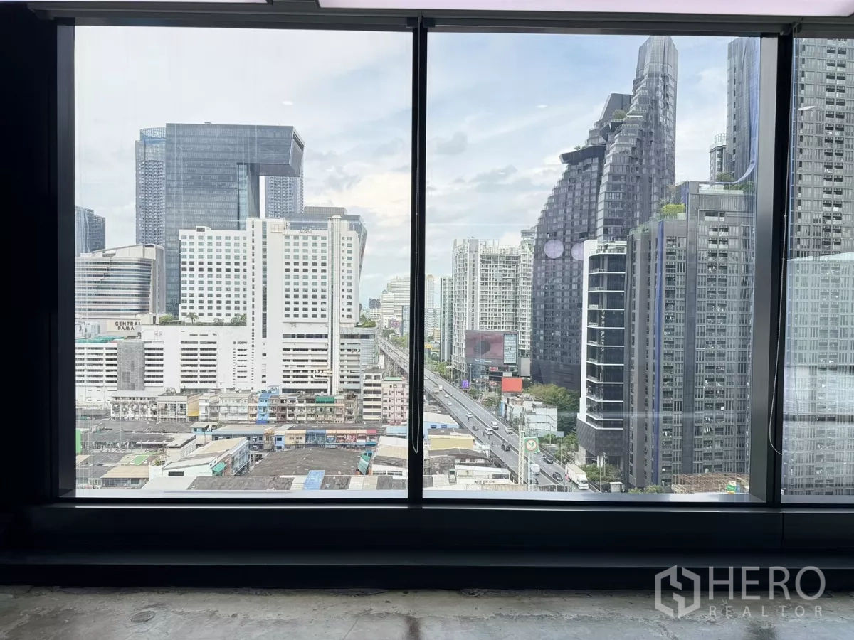 Office Space for rent in Din Daeng, Bangkok - View of the Rama 9 business district through a floor-to-ceiling window.