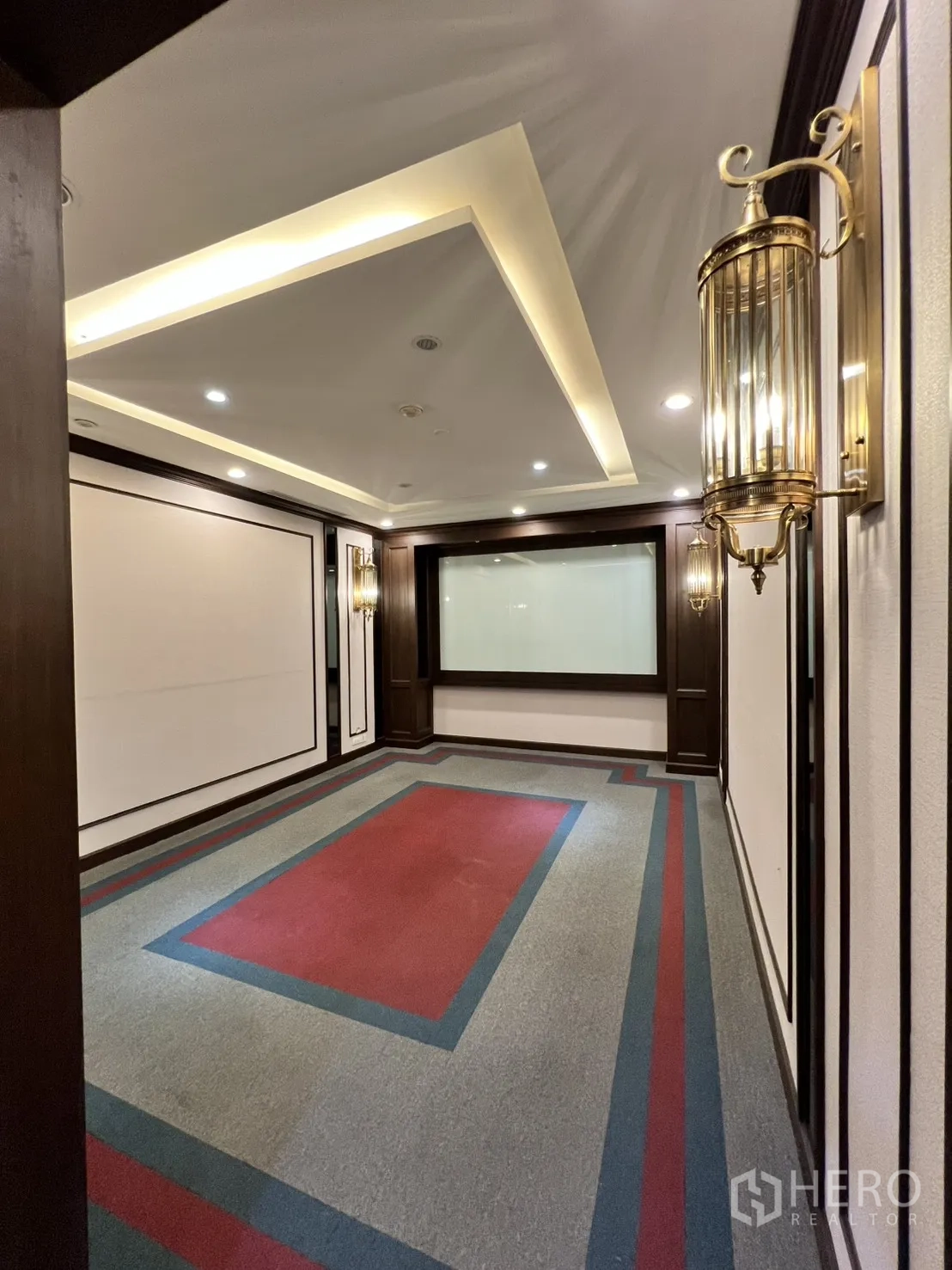 Office Space for rent in Watthana, Bangkok - Carpeted meeting room with coffered ceiling and brass wall sconces.