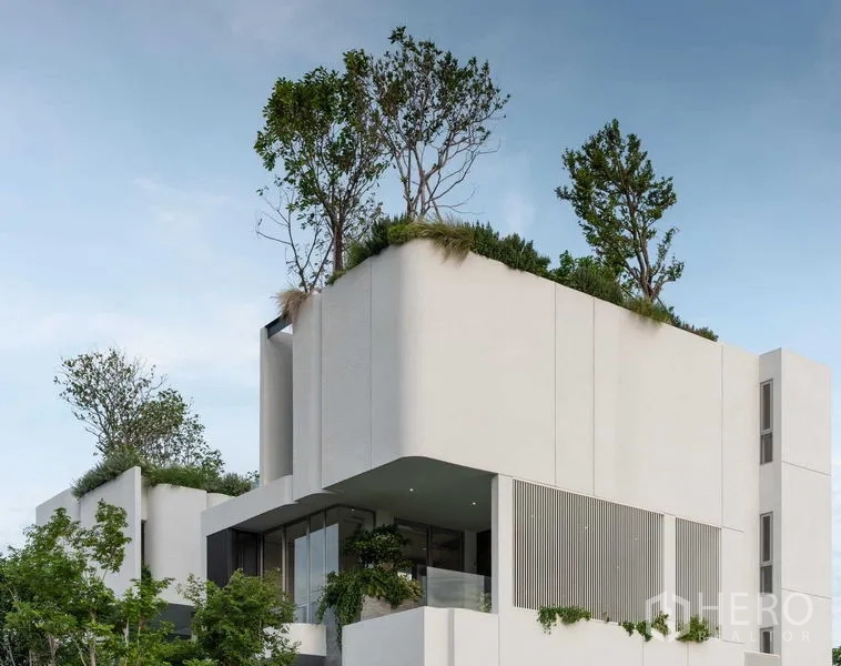 Detached House for sale in Saphan Sung, Bangkok - Spa-style bathroom with freestanding tub and full-height window to garden.