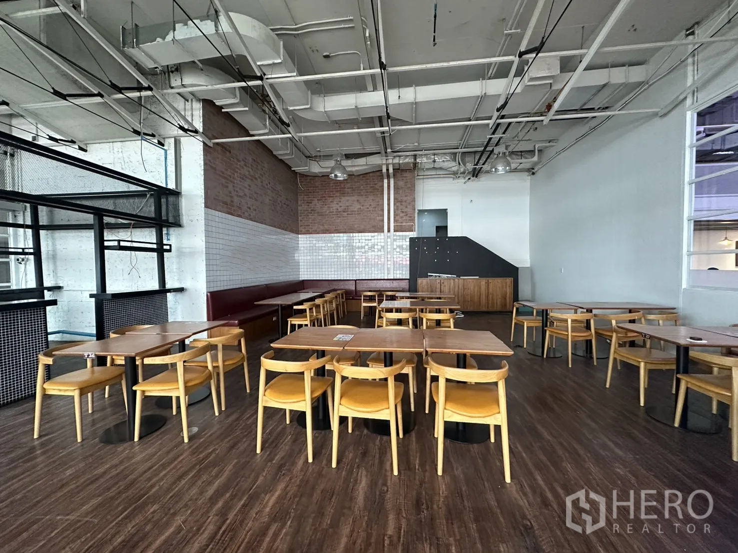 Retail Space for rent in Watthana, Bangkok - Spacious dining area with wood-look flooring and ample natural light.