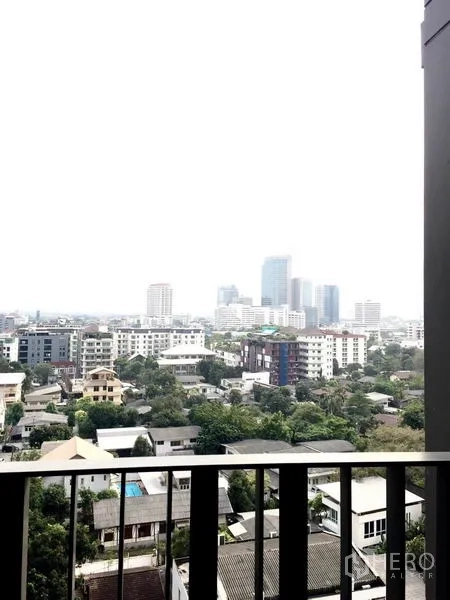 Condominium for rent in Khlong Toei, Bangkok - High-floor balcony view over Bangkok skyline and surrounding neighborhood.