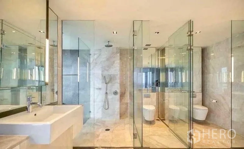 Condominium for rent - Luxury bathroom with glass shower, twin vanity and separate toilet.