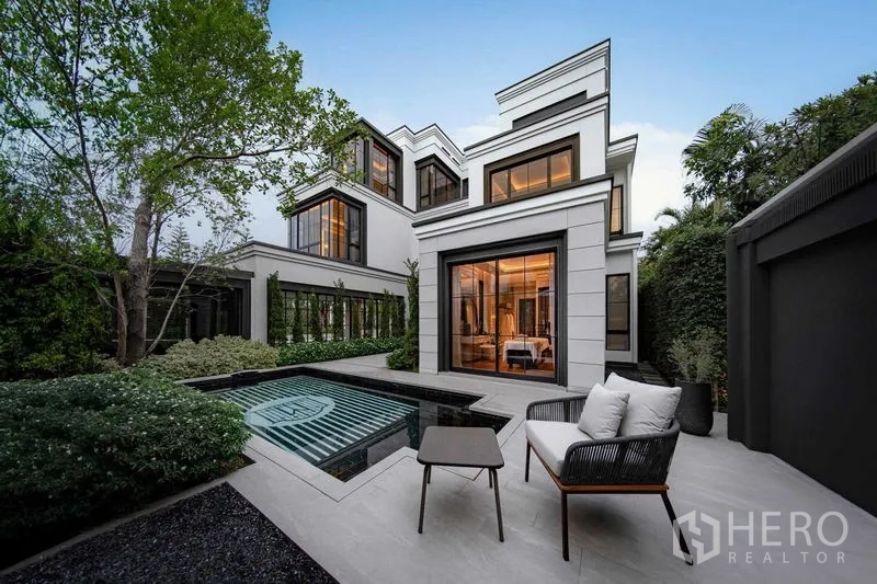 Detached House for sale in Saphan Sung, Bangkok - Private courtyard featuring a plunge pool, garden greenery and sliding glass doors to the bedroom.