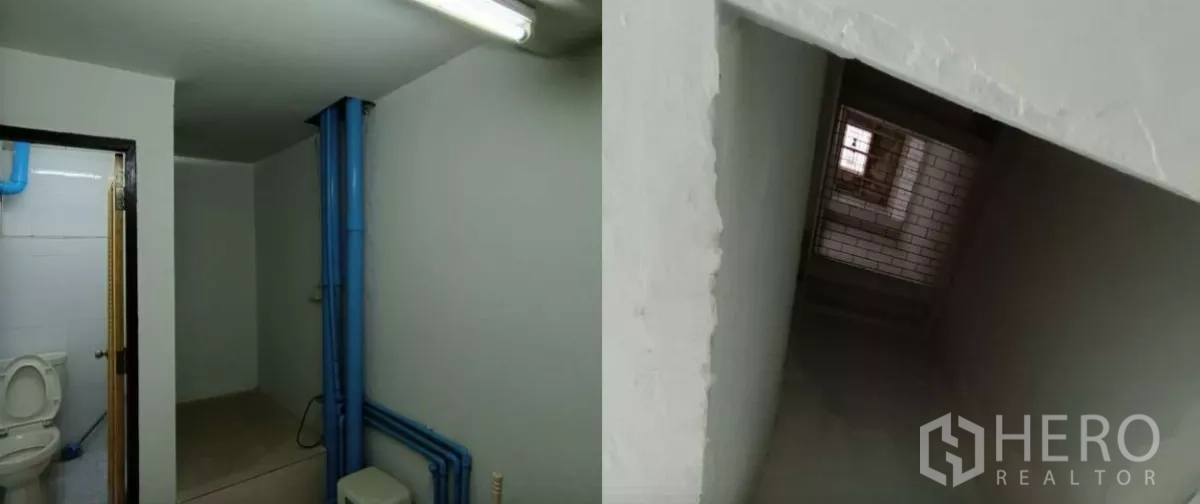 店屋 出租在Bang Rak, Bangkok - 基础卫生间，外露蓝色管线与狭窄室内楼梯井。