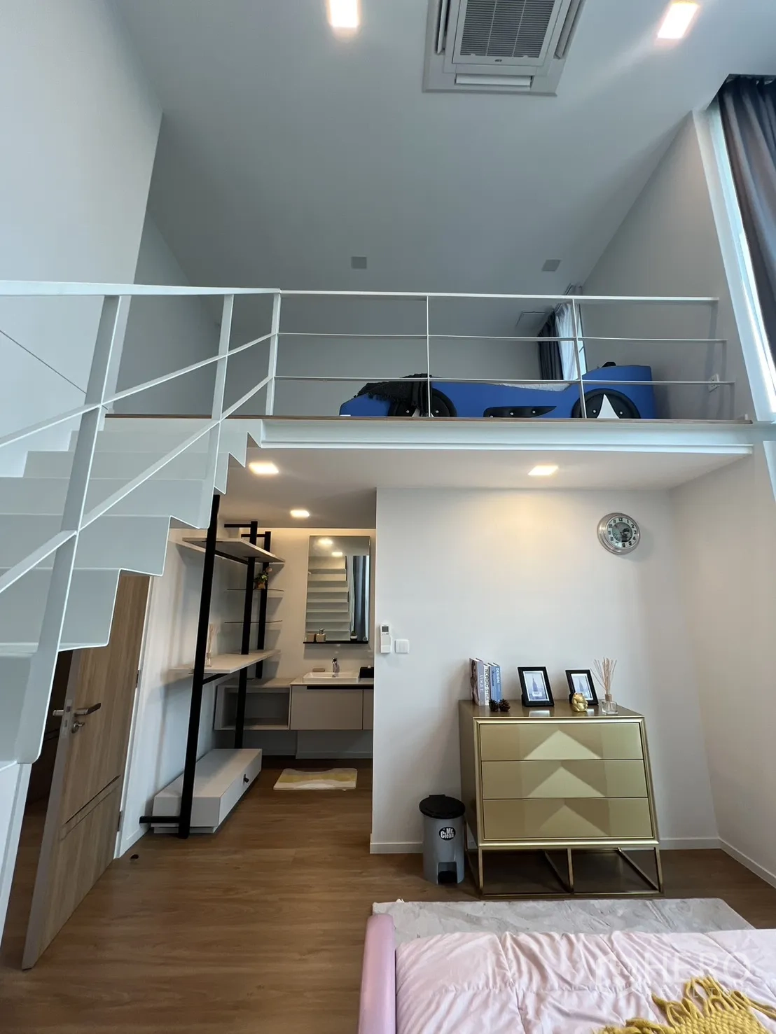 Detached House for rent in Saphan Sung, Bangkok - Double-height bedroom with tall windows and flowing curtains.