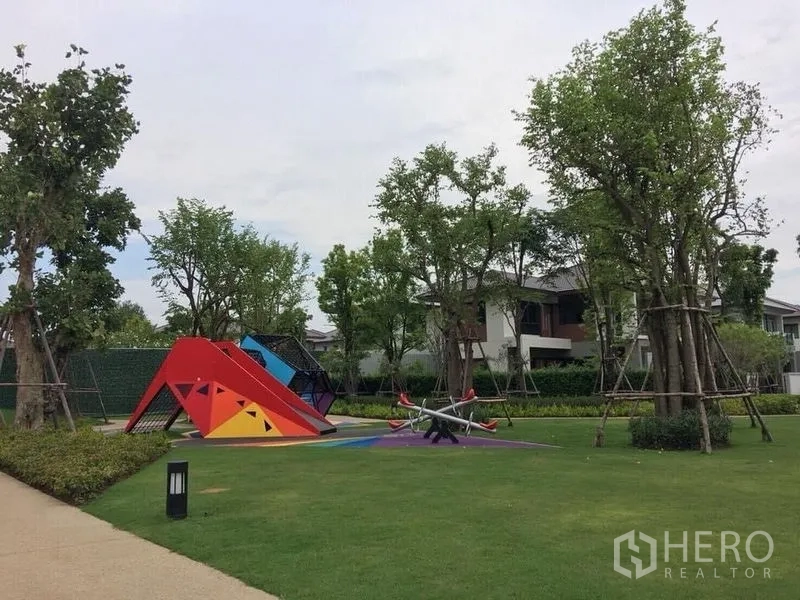 Detached House for sale - Leafy community park featuring a colorful children’s playground and open lawn.