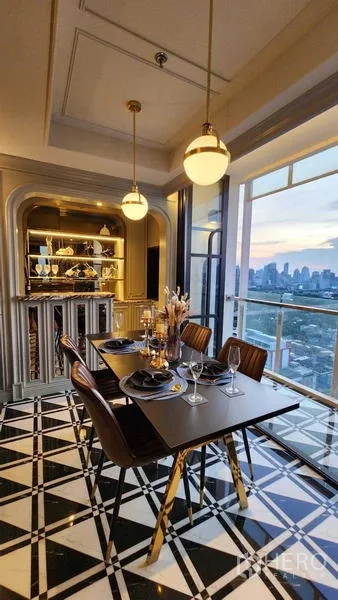 Condominium for sale - Dining nook with pendant lights, display shelves and black-and-white tiled floor.