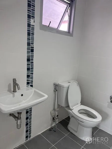 Home Office for sale in Lat Krabang, Bangkok - Bathroom with wall-mounted sink, toilet and small sliding window.