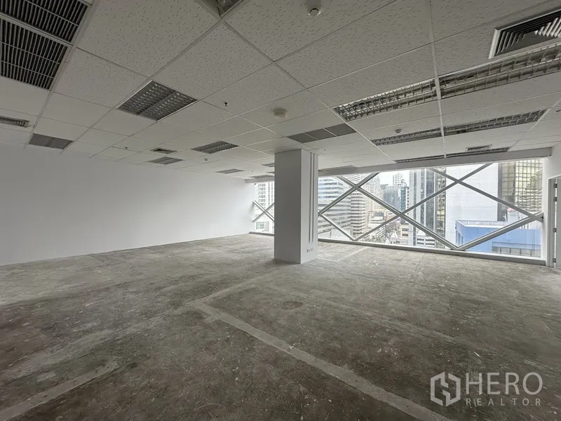 Office Space for rent in Watthana, Bangkok - Open office showing expansive windows overlooking the downtown skyline.