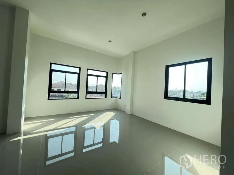 Warehouse for rent or sale - Corner office with multiple windows, glossy tiled floor and natural light.