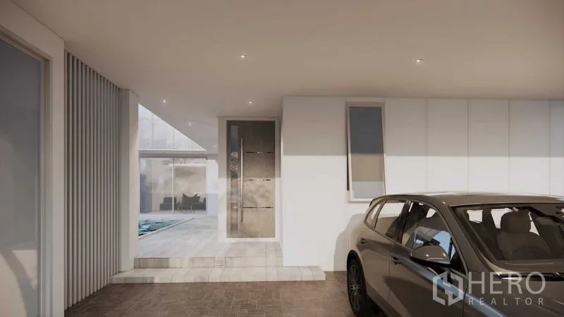 Land for sale in Prawet, Bangkok - Covered entrance and carport render leading to glass doors, with the pool visible beyond.