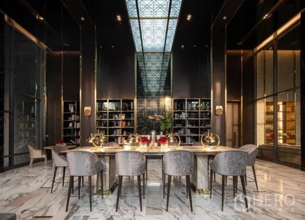 Condominium for rent in Watthana, Bangkok - Elegant co-working library with high ceiling, skylight, marble floor and bookshelves.