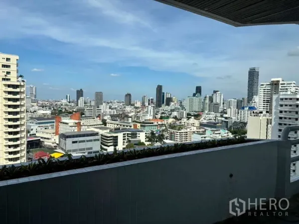 Condominium for rent in Watthana, Bangkok - Balcony view over Bangkok skyline from high floor.