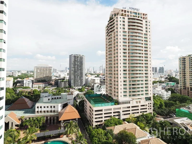 Condominium for rent in Sathon, Bangkok - Balcony skyline view over Sathon with high-rise towers and lush greenery in Bangkok.